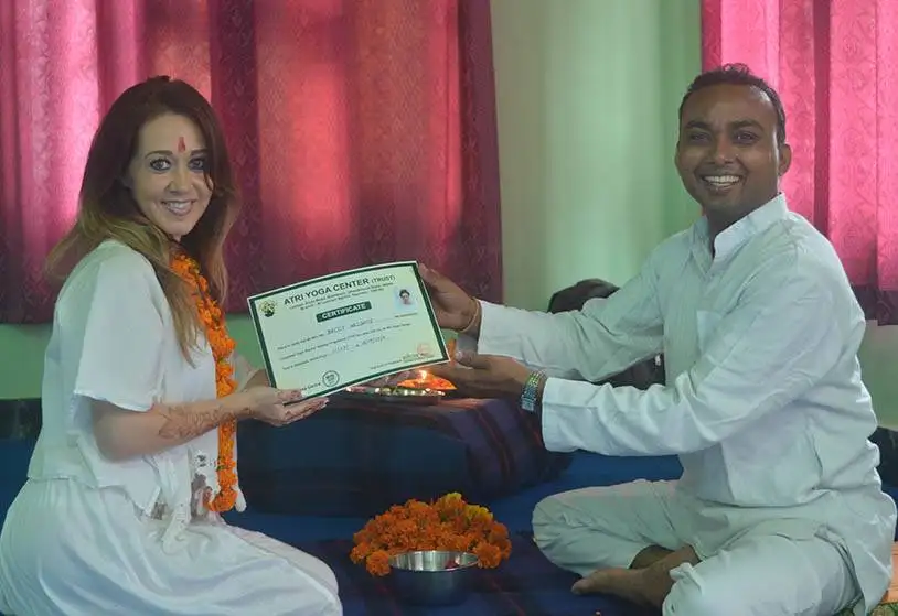 yoga student passing yoga teacehr training certification in rishikesh
