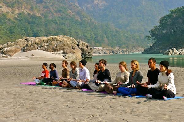 yogi student doing meditation in rishikesh